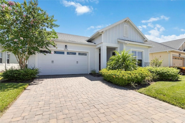 view of front of property with a garage