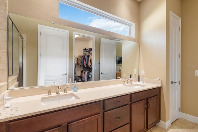 bathroom featuring vanity and tile patterned flooring