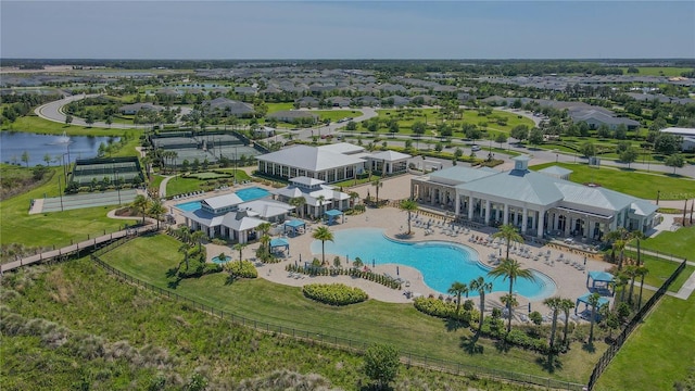 birds eye view of property with a water view