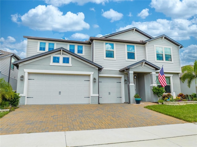 view of front of property featuring a garage