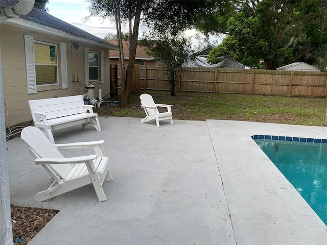 exterior space featuring a fenced backyard and a fenced in pool