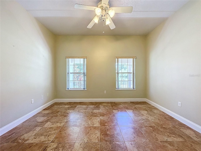 spare room featuring ceiling fan