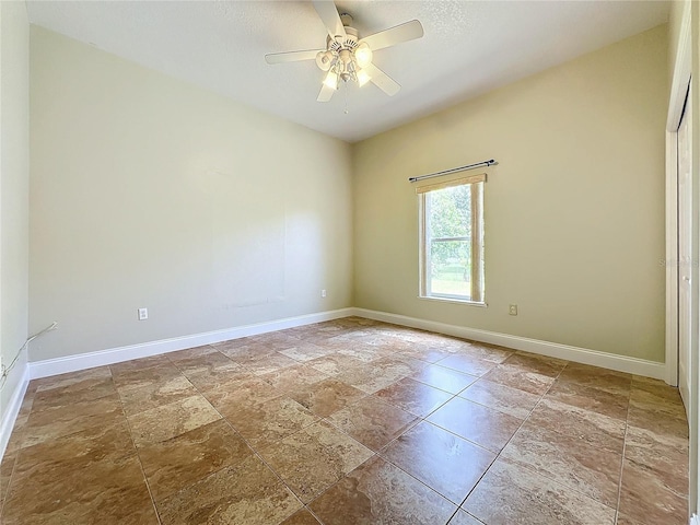 unfurnished room featuring ceiling fan