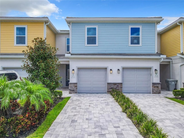 view of front of property featuring a garage