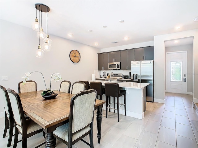 dining space with light tile patterned floors