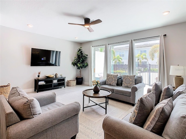 living room featuring ceiling fan