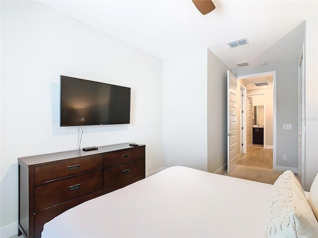 bedroom featuring ceiling fan and light wood-type flooring