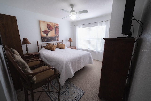 bedroom with carpet flooring and ceiling fan