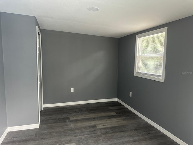 spare room featuring hardwood / wood-style floors