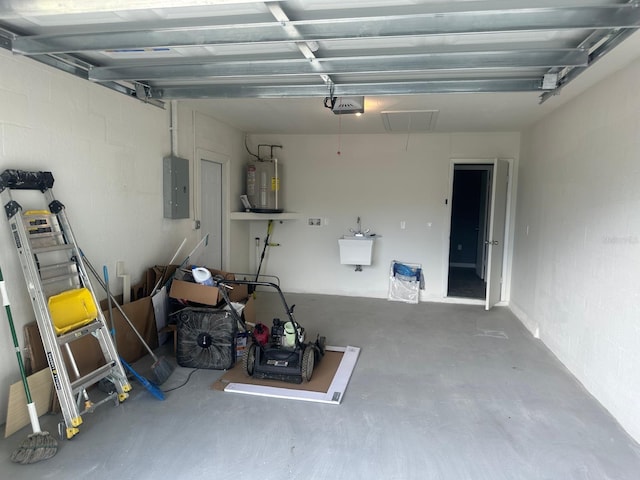 garage with water heater, electric panel, and a garage door opener