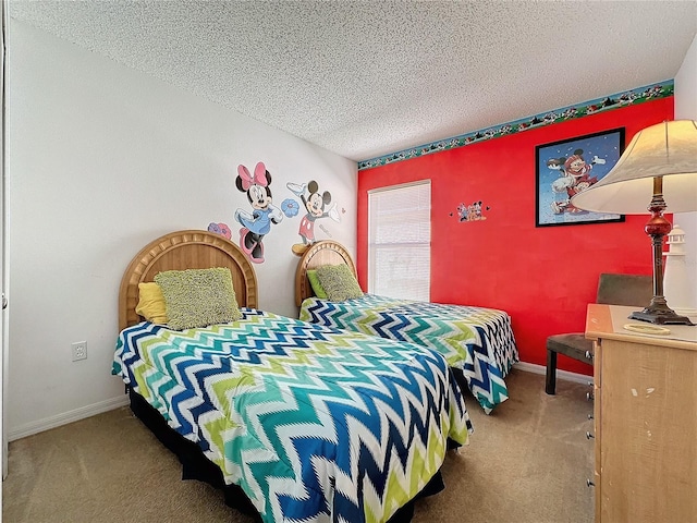 bedroom with carpet and a textured ceiling