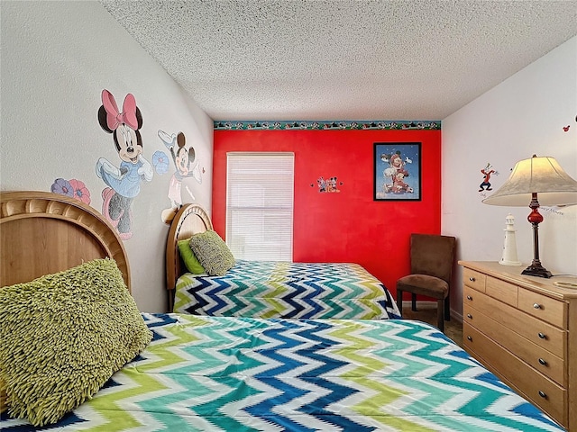 bedroom featuring a textured ceiling