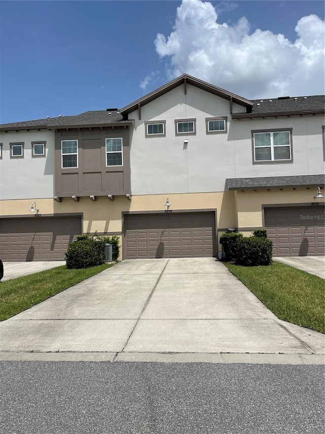 view of property featuring a garage