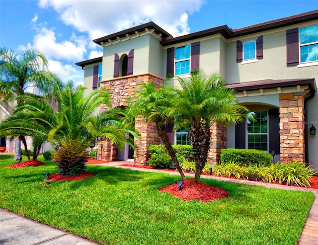 view of front of property with a front yard