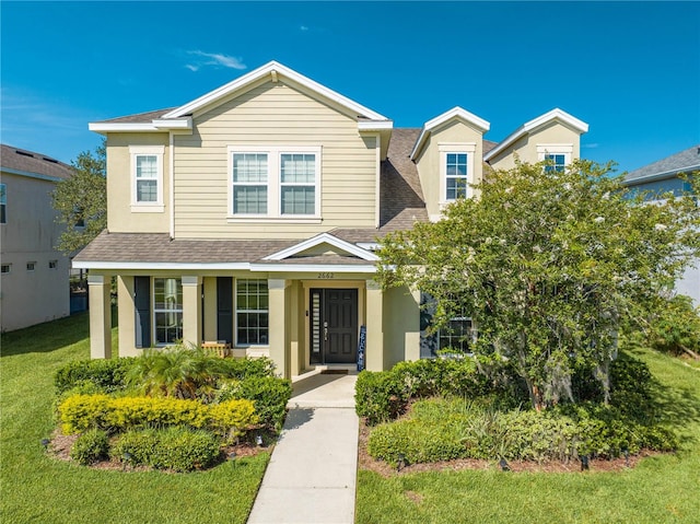 view of front of house featuring a front lawn