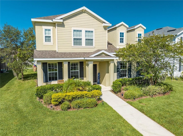 view of front of house with a front lawn