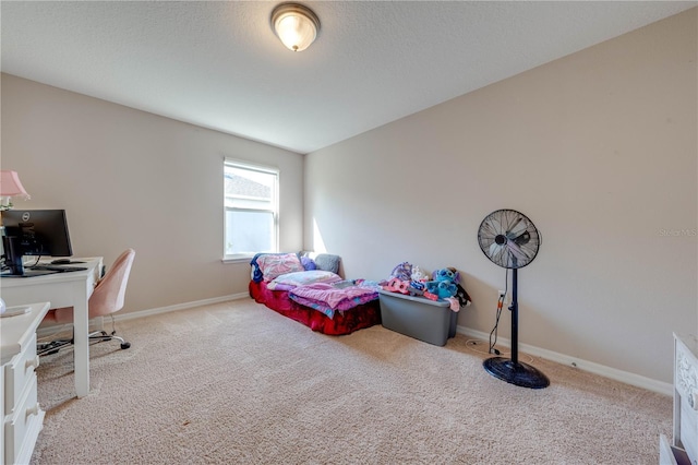 carpeted bedroom with a textured ceiling