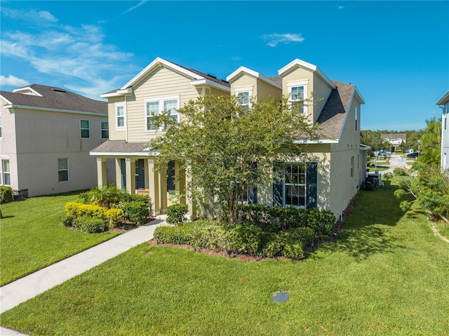 view of front of property with a front lawn