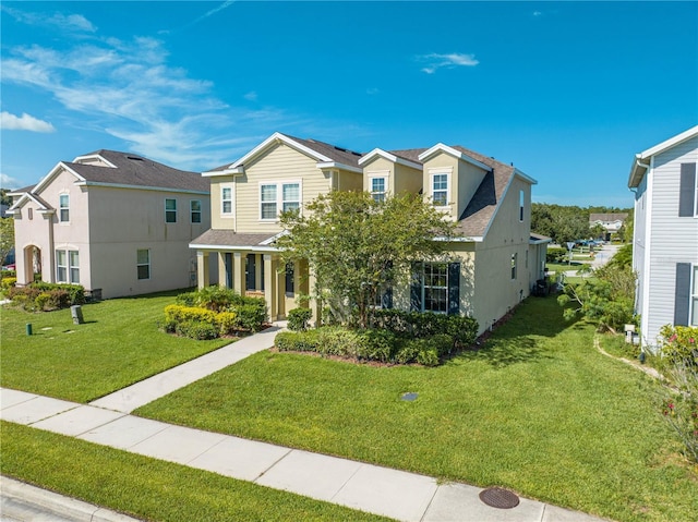 view of front of home featuring a front lawn and a porch