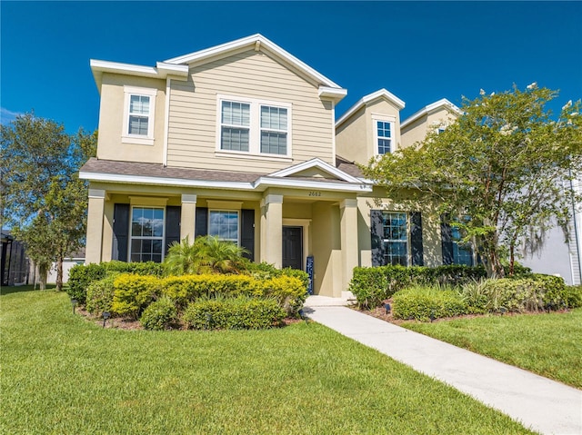 view of front of property with a front lawn