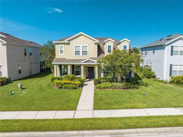 view of front of house with a front lawn