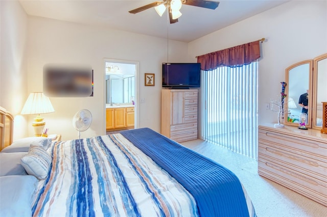 carpeted bedroom featuring connected bathroom, access to exterior, and ceiling fan