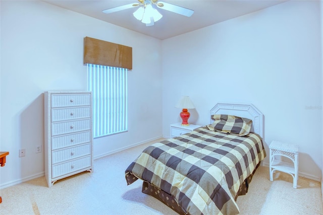 bedroom featuring ceiling fan and carpet flooring