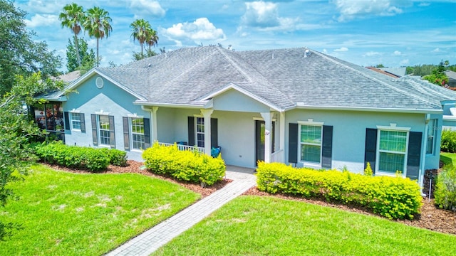 ranch-style house featuring a front lawn