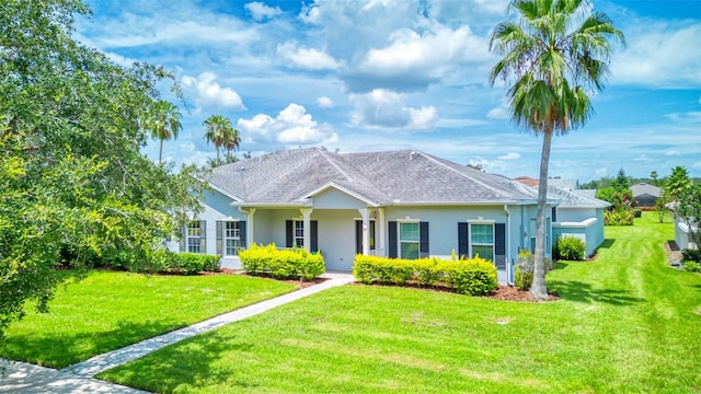 ranch-style home with a front yard