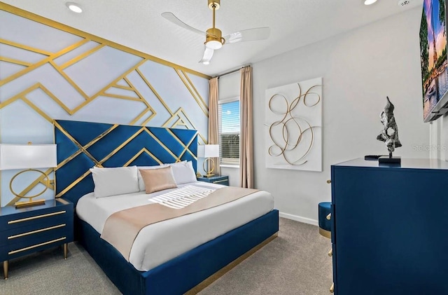 bedroom with ceiling fan and carpet floors