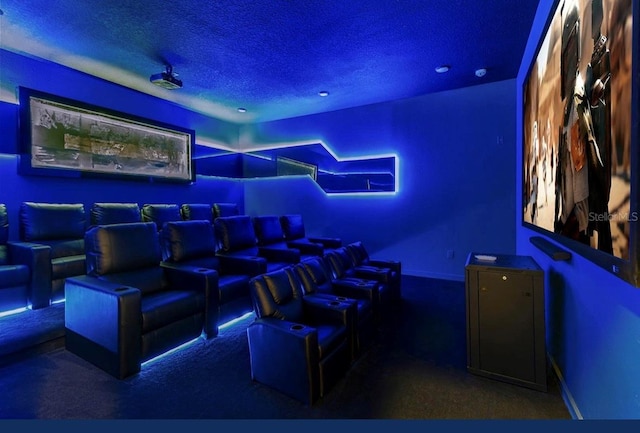 home theater featuring a textured ceiling