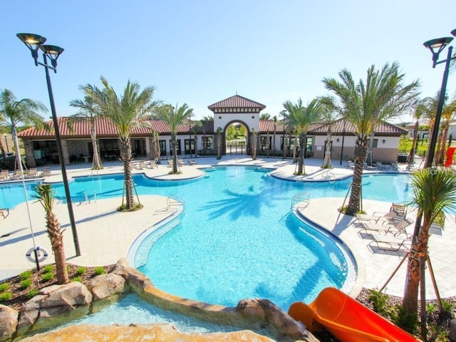 view of pool featuring a patio