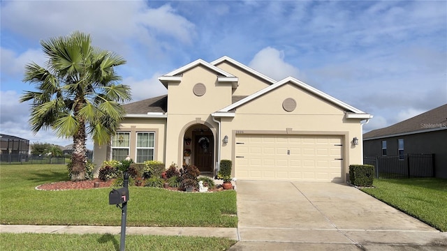 view of front of house with a garage and a front yard