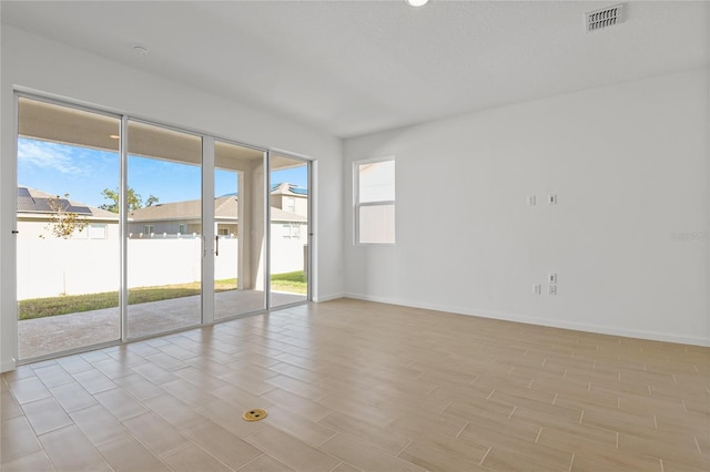 2043 Stetson Ct, Eagle Lake, FL 33839 - spare room with baseboards and light wood-style floors