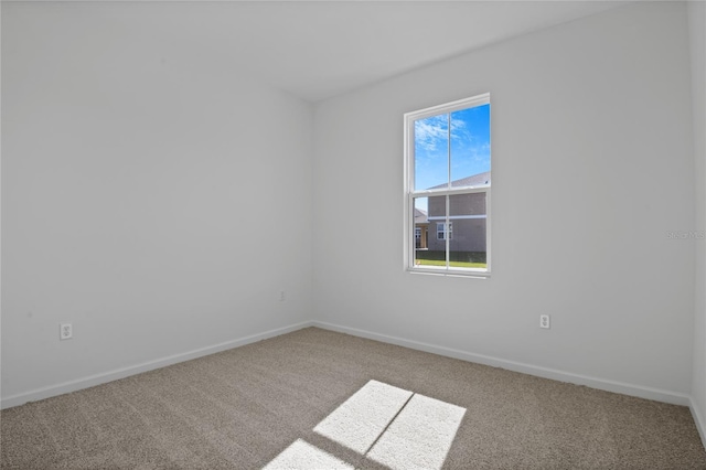 spare room with carpet flooring