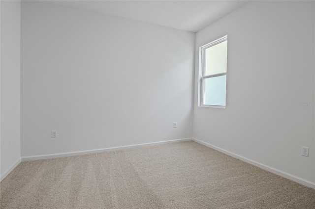 empty room featuring carpet flooring