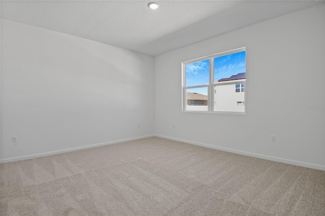 2043 Stetson Ct, Eagle Lake, FL 33839 - carpeted spare room with baseboards and a textured ceiling