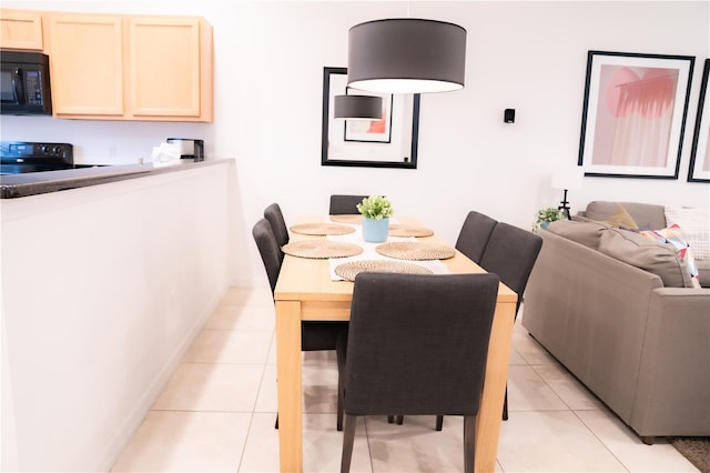 view of tiled dining space