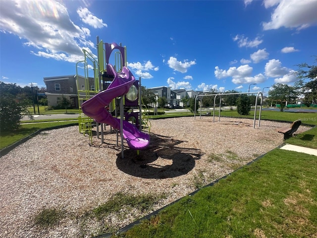 view of jungle gym with a yard