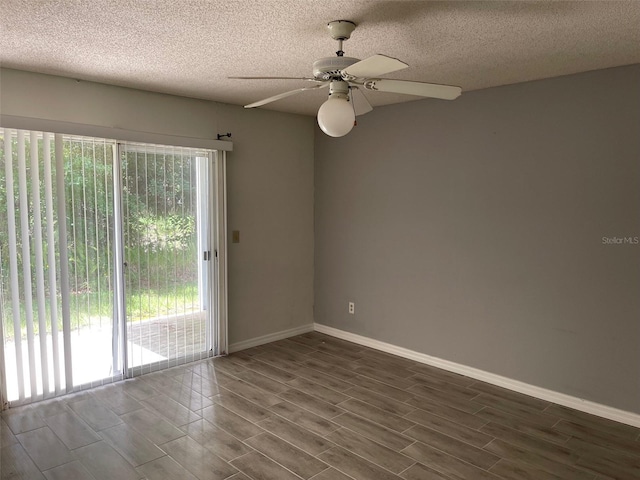 empty room featuring a textured ceiling, ceiling fan, and hardwood / wood-style floors