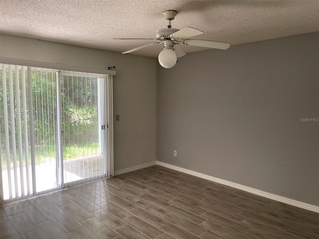 2022 Royal Bay Blvd Unit 93, Kissimmee, FL 34746 - unfurnished room with plenty of natural light, wood tiled floor, baseboards, and a ceiling fan