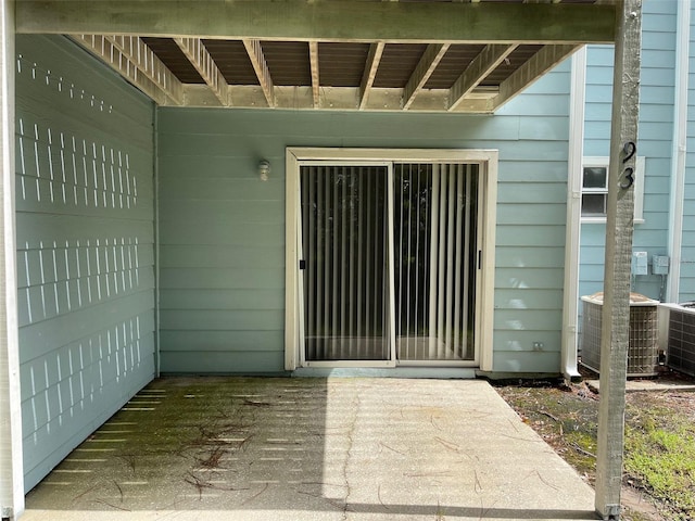 2022 Royal Bay Blvd Unit 93, Kissimmee, FL 34746 - doorway to property with central AC
