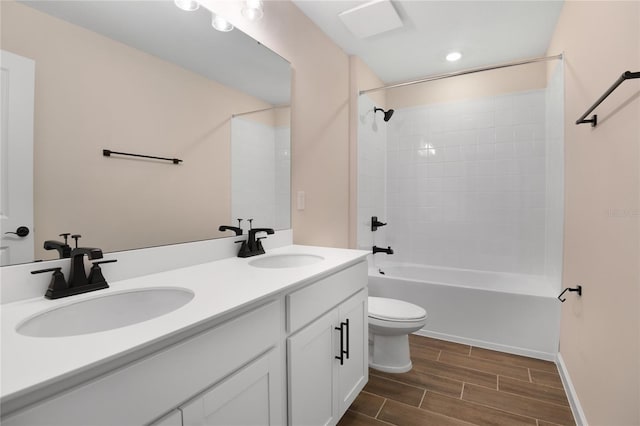 full bathroom featuring vanity, shower / bathtub combination, and toilet