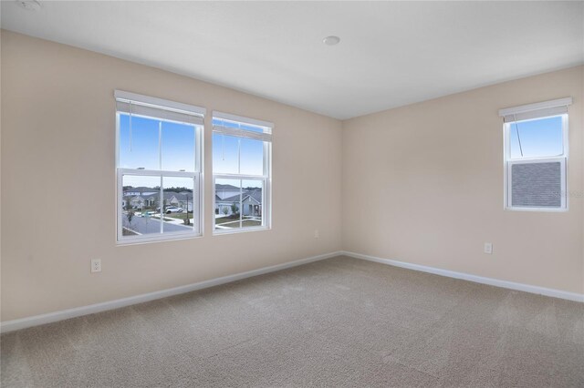 view of carpeted spare room