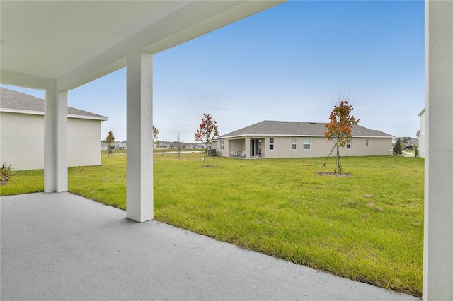 view of yard with a patio area