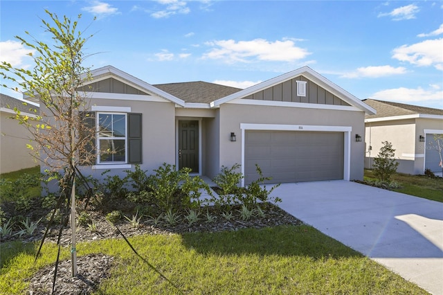 ranch-style home featuring a garage and a front yard