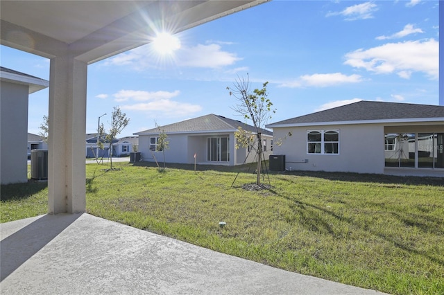 view of yard featuring a patio area and cooling unit