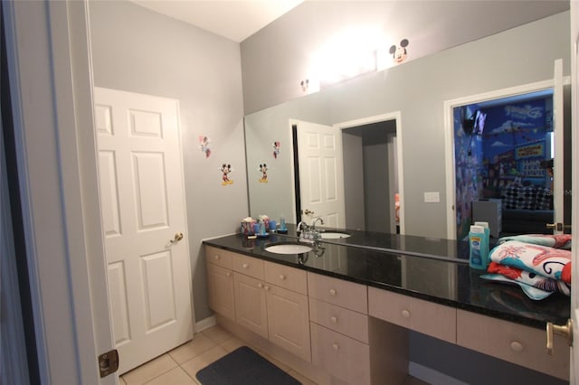 bathroom featuring vanity and tile patterned flooring