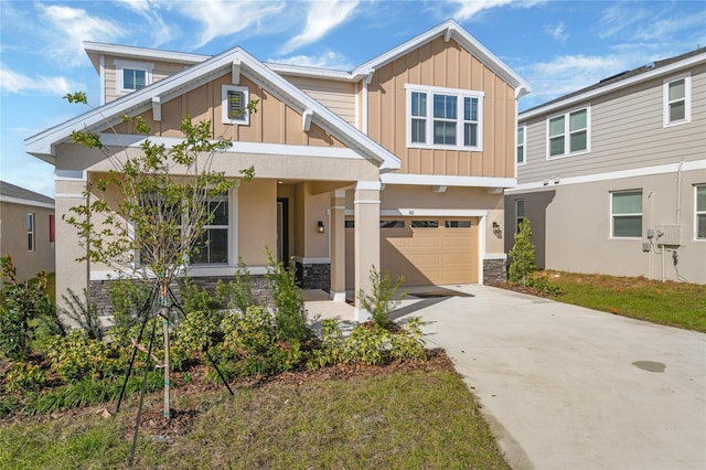 view of front of home featuring a garage and a front lawn