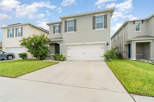 6728 Huntleigh Hammock Rd, Harmony, FL 34773 - traditional-style home featuring an attached garage, stucco siding, concrete driveway, and a front lawn